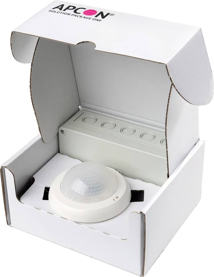 Öppna vit APCON-paketlåda innehållande en rund rörelsesensor och en rektangulär kontrollenhet med kabelöppningar.