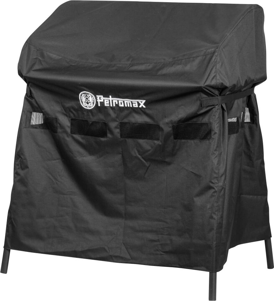 Svart Petromax-grill eller eldstadskåpa anpassad över en rektangulär utomhusmatolagningsenhet, med sidöppningar och fyra ben synliga.