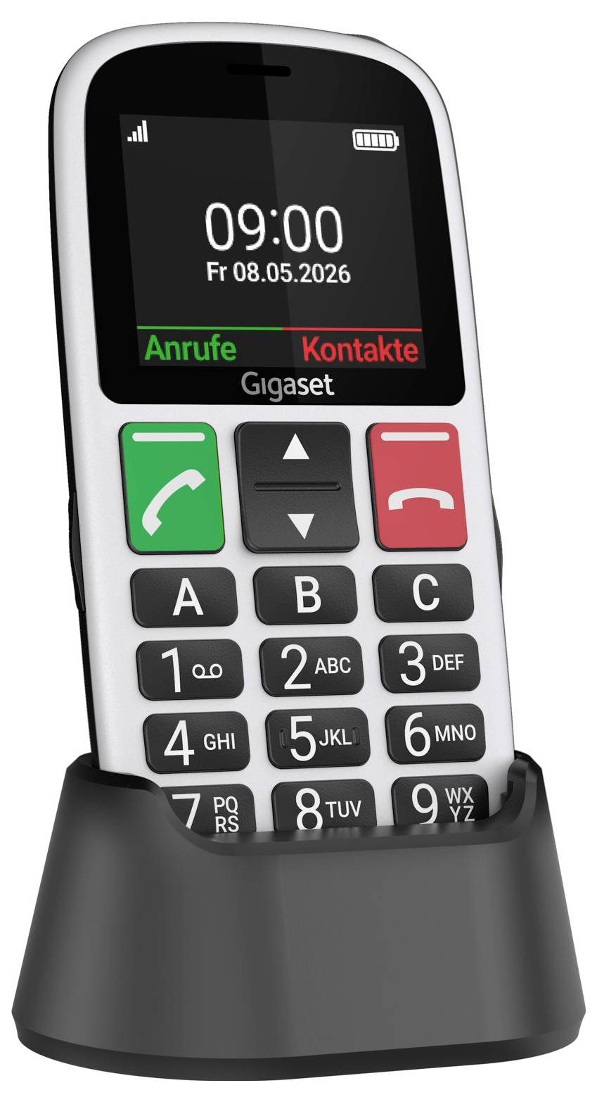 En vit senior mobiltelefon i en laddningsstation, som visar 09:00, datumet 08.05.2026 och tyska menylablar 'Anrufe' och 'Kontakte'.