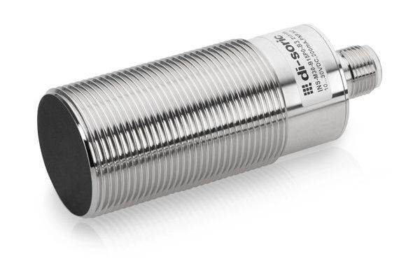 Cylindrisk silvertråstad metallsensor med svart frontyta, visad på vit bakgrund.