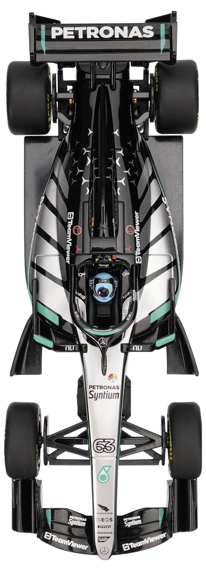 Toppvy över en PETRONAS Formula 1-racerbil med svart, vit och turkos lackering och nummer 63 på nosen.
