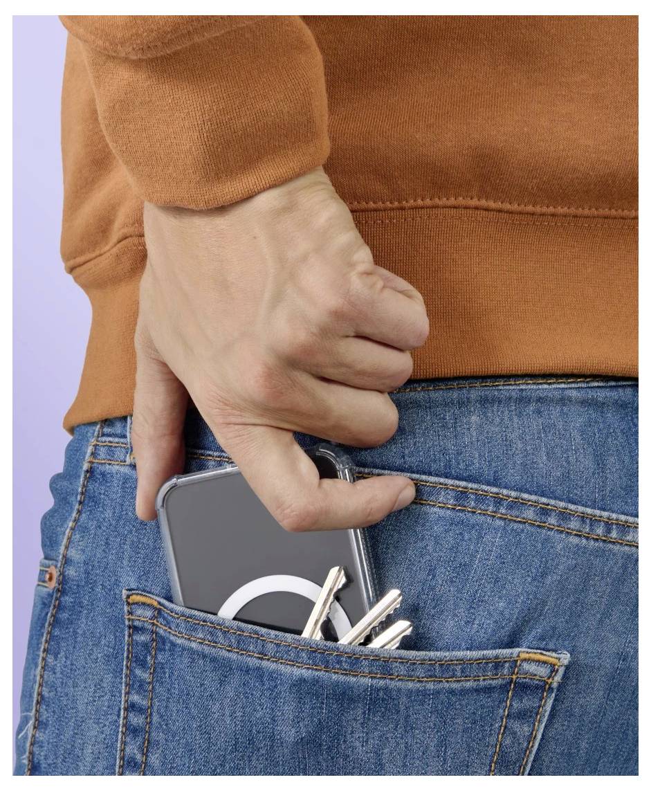 Hand stjäl en smartphone från bakfickan på jeans, vilket föreslår ficktjuveri eller stöld.
