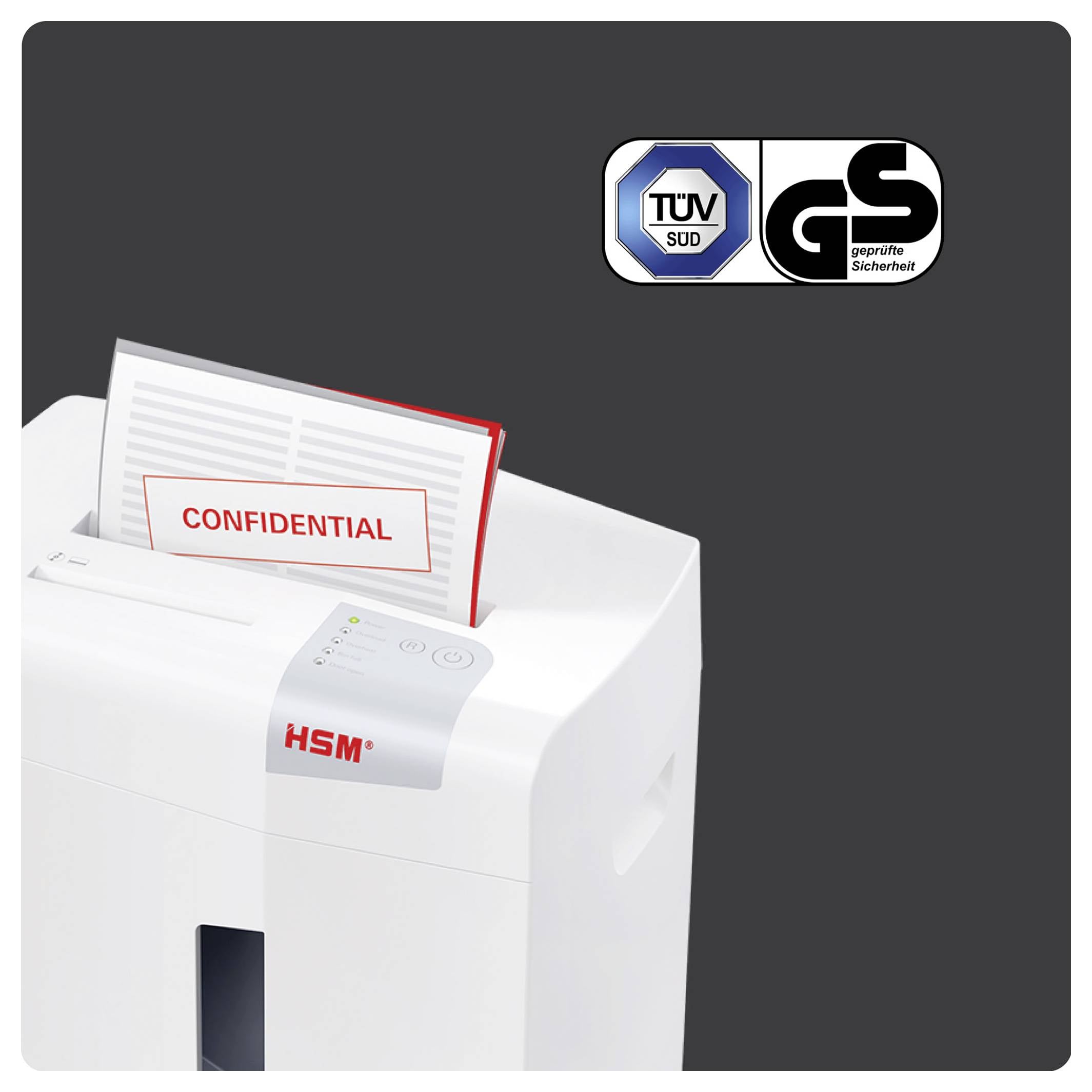Vit HSM-pappersförstörare som förstör en stapel konfidentiella dokument, med TÜV SÜD och GS-säkerhetscertifieringslogotyper ovanför.