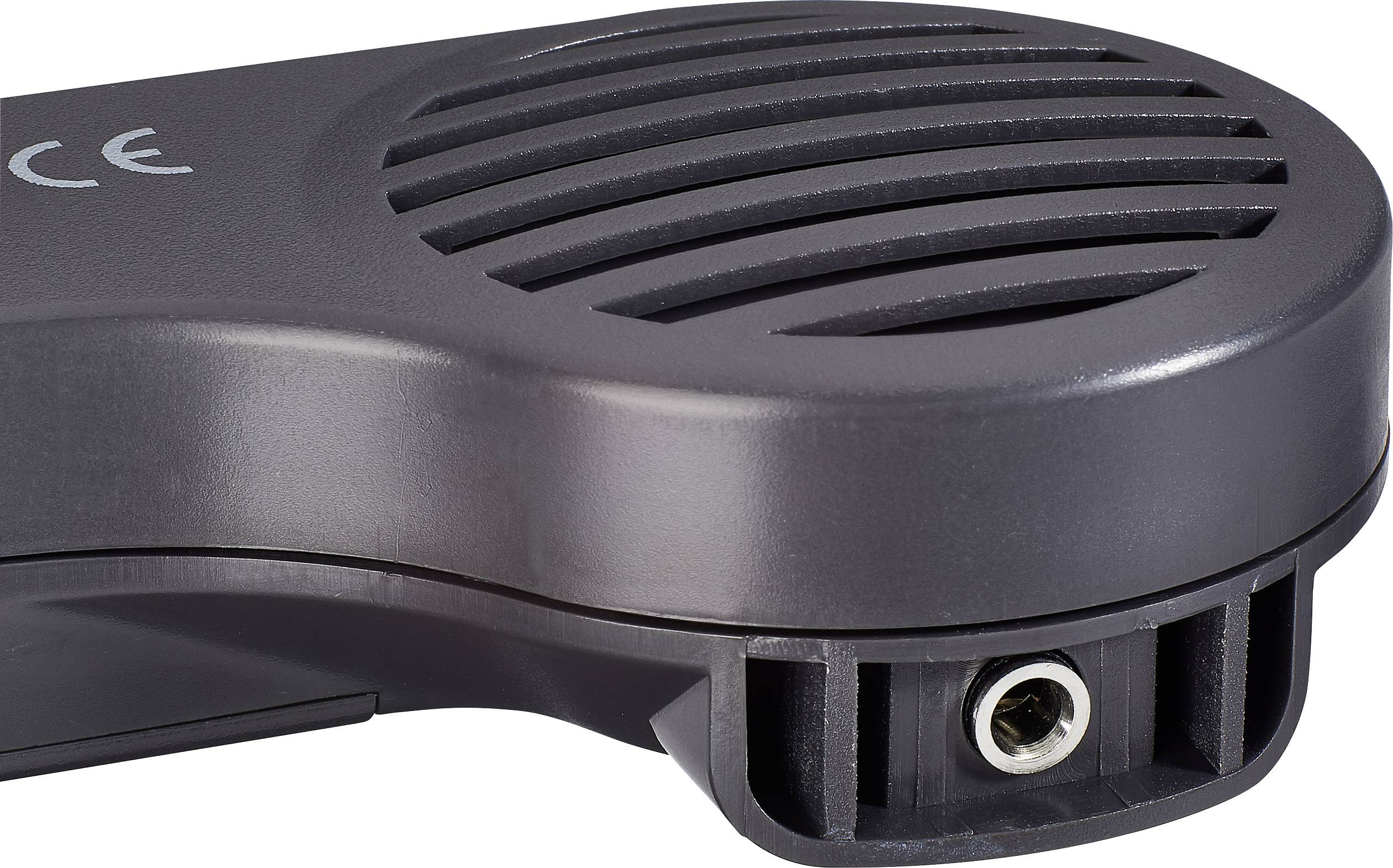 Svart elektronisk enhet med ett rundslipat, räfflat område och en anslutning på sidan.