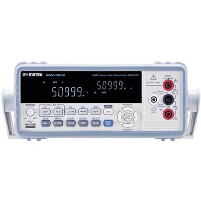 Multimeter med digitalt display visar '50999'. Olika kontroller och anslutningar är synliga, lämpliga för elektriska mätningar.