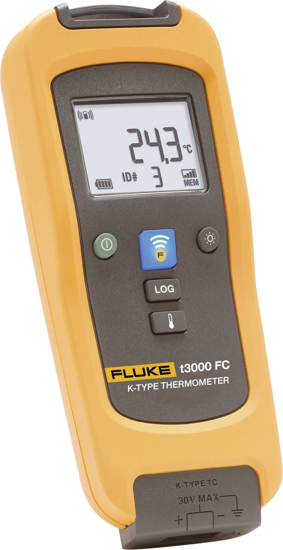 En digital, gul handhållen termometer med en display som visar '24,3 °C'. Den har knappar för Logg, WLAN och Meny.
