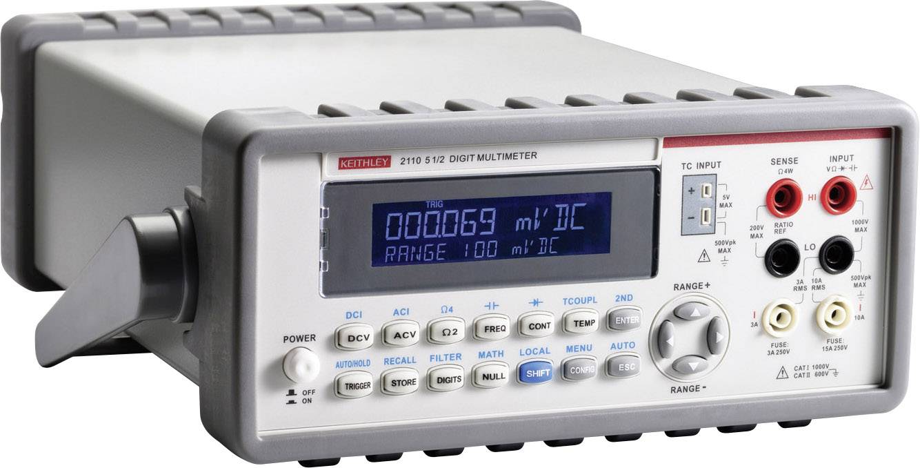 Digitalt multimeter med blå display visar '000069 mV DC'. Olika knappar och anslutningar på framsidan.