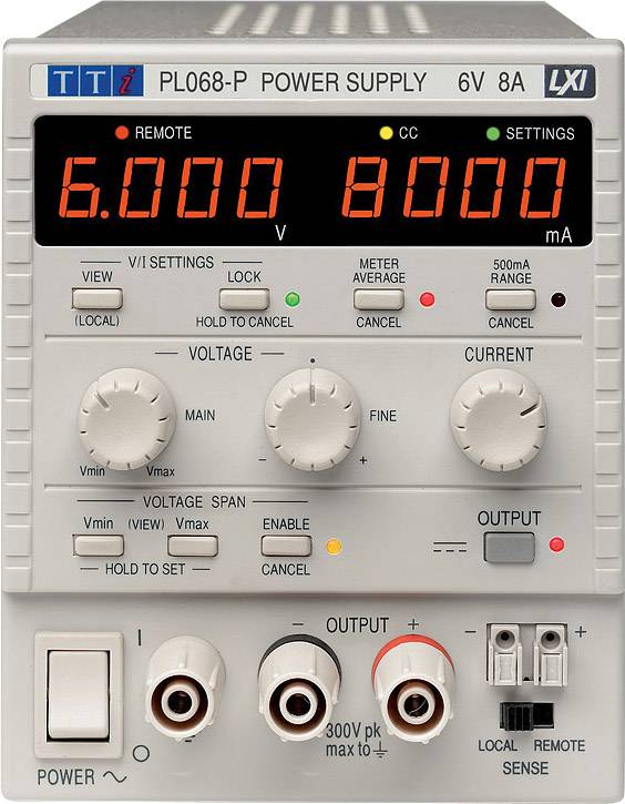 Ett digitalt nätaggregat med display '6.000 V' och '8.000 mA'. Kontroller för spänning och strömstyrka finns nedtill.