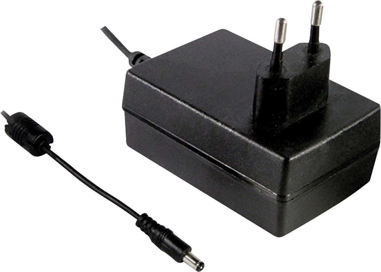 Svart nätadapter med två kontakter och en kabel som kan anslutas till olika elektroniska enheter.