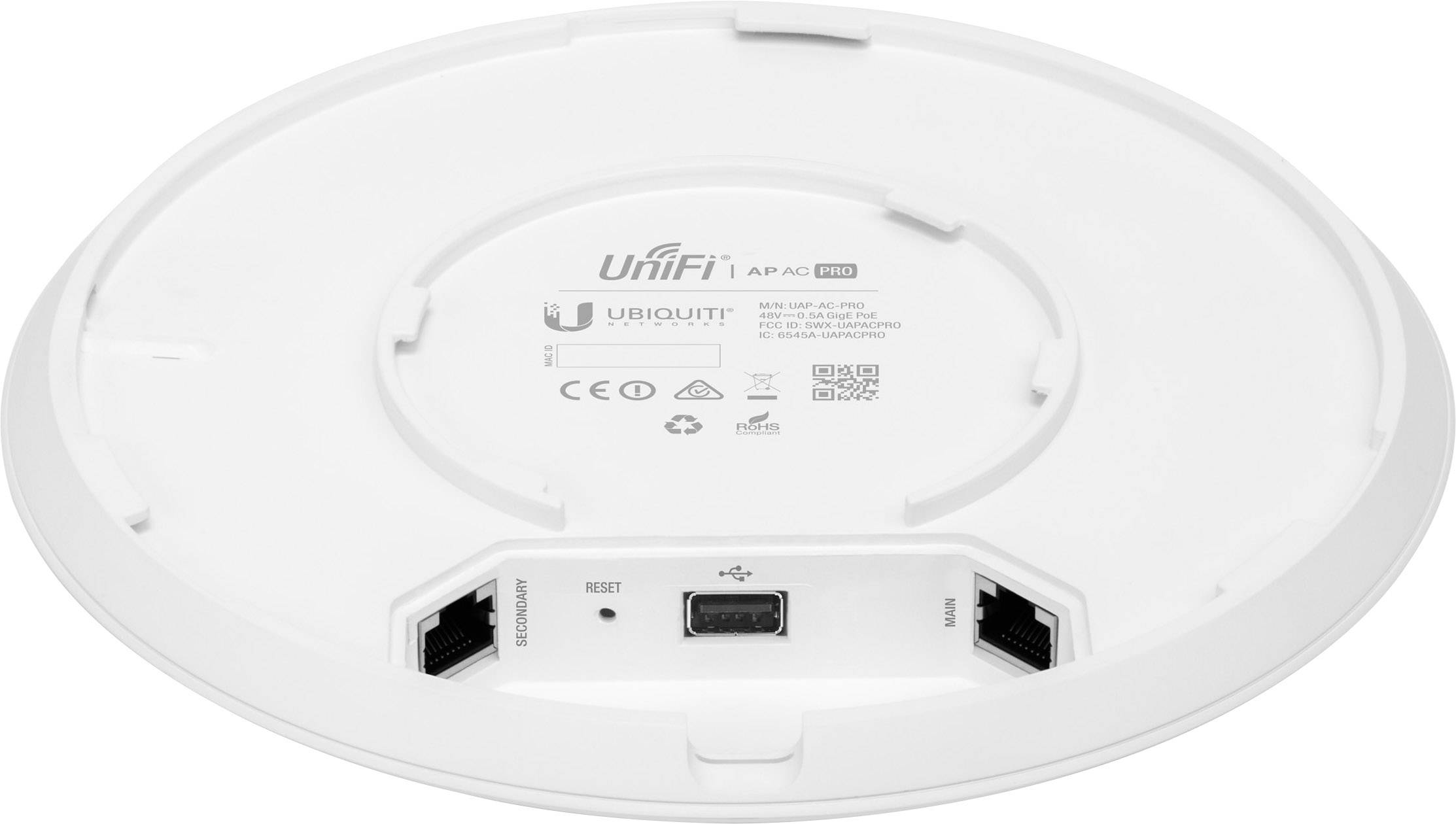 Baksidan av en Ubiquiti UniFi AP AC Pro accesspunkt med Ethernet-portar, återställningsknapp och tillverkarlogotyp.