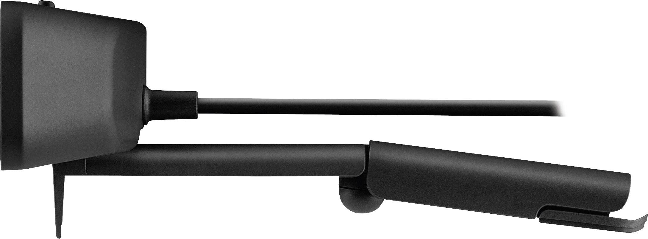 Sidovy av ett svart VR-headset som är monterat på en skärm, vilket betonar den smala designen och funktionaliteten.