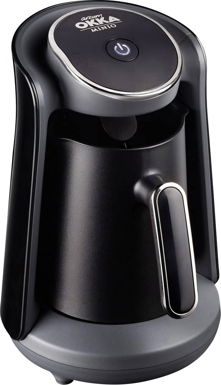 Elektrisk kaffebryggare med svart hölje och silverfärgat handtag. Ovanpå finns en påknapp.