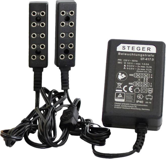 En svart belysningstrafo från Steger med två grenuttag, lämplig för anslutning av flera mindre enheter.