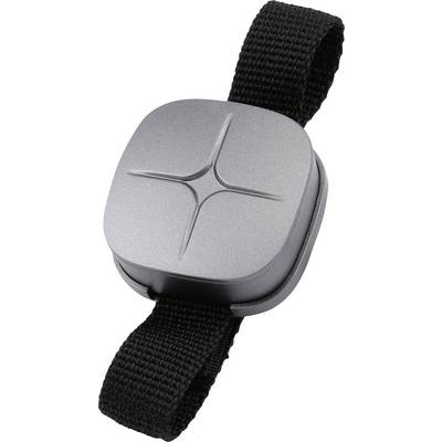 En liten grå elektronisk enhet med ett svart armband, sannolikt en bärbar sensor eller tracker.