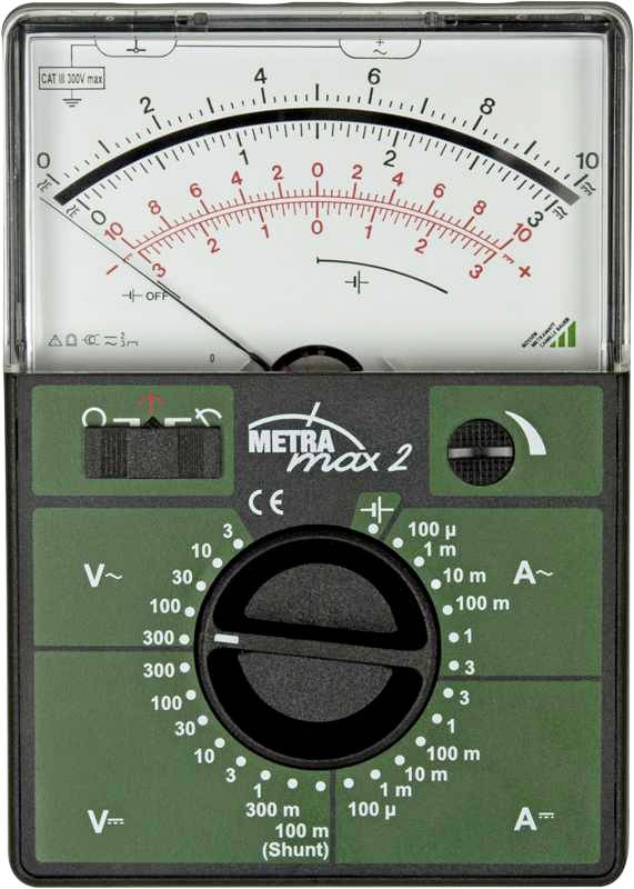 Analogt multimeter i grönt hölje, märke 'Metra max 2', visar spänning och ström på skalan. Vridbar omkopplare för funktionsval.