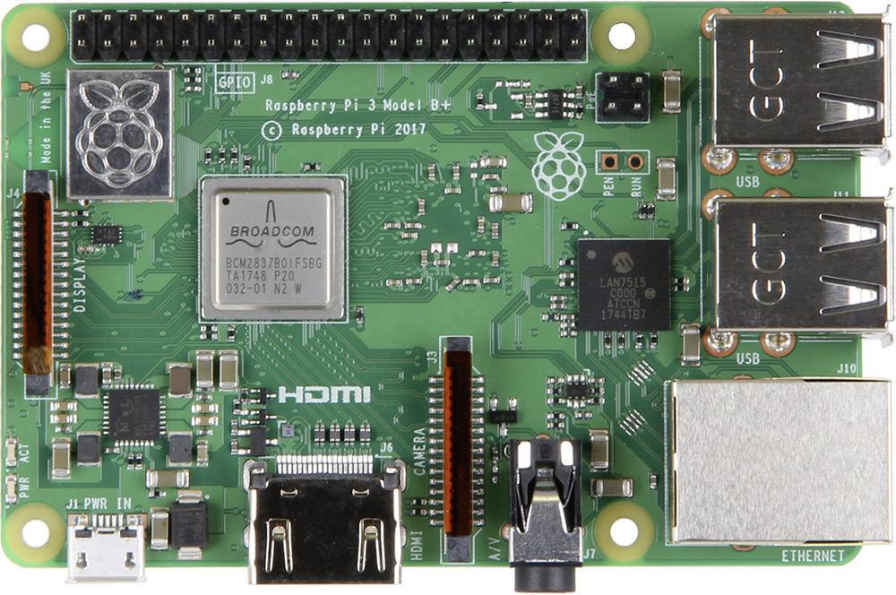 En Raspberry Pi 3 Model B+ kretskort som visar anslutningar och komponenter, inklusive USB-portar, HDMI-utgång och Ethernet-port.