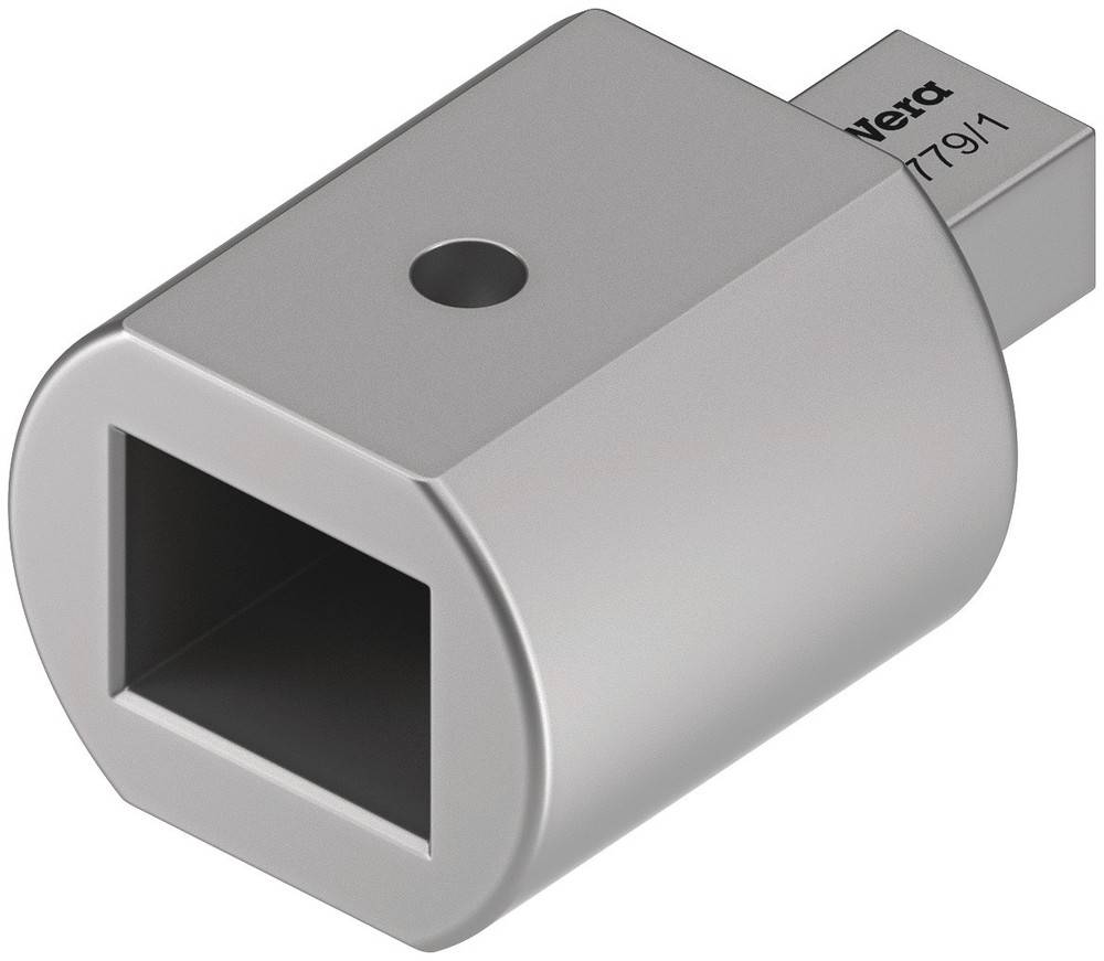 Silveraktig adapter med rektangulär öppning och ett rundformat hål på ovansidan, möjligen avsedd för specialiserade anslutningsändamål.