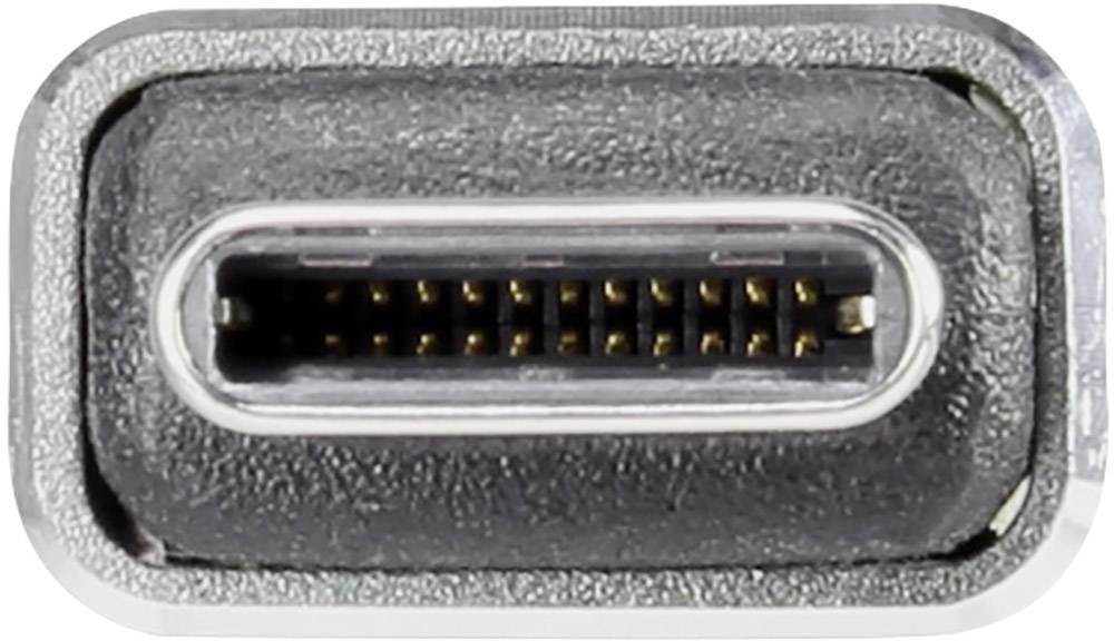 Närbild av en USB-C-kontakt med oval form och flera synliga små metallkontakter inuti.