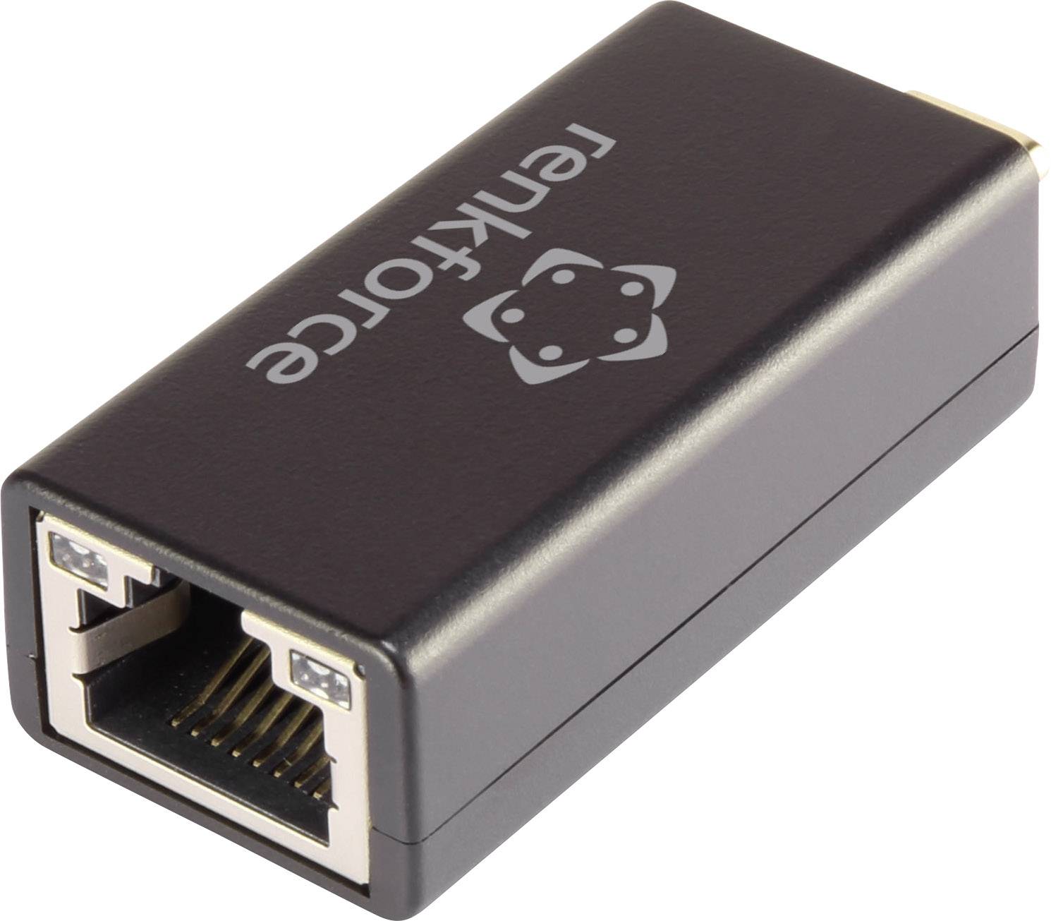 En svart nätverksadapter med Ethernet-port, liggande på sidan på en ljus yta.