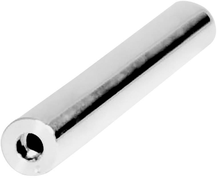 En cylindrisk metallpinne med ett centralt hål i mitten, sannolikt en del av en mekanisk eller teknisk apparat.
