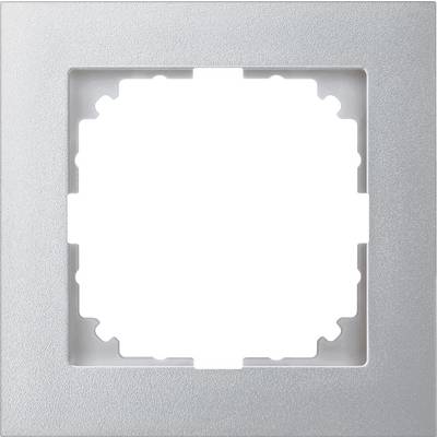 En silver fyrkantig ram för en ljusströmbrytare eller ett eluttag, utan insatt modul, med blank yta.