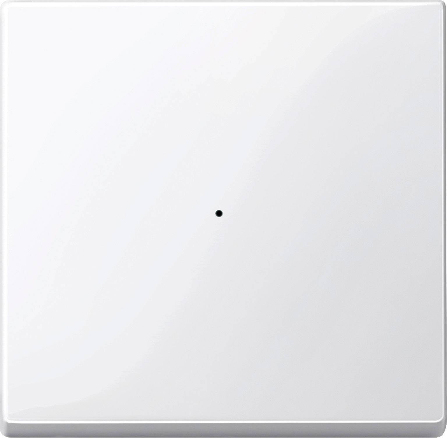 En vit, kvadratisk strömbrytare med en liten svart punkt i mitten, framför en neutral bakgrund.