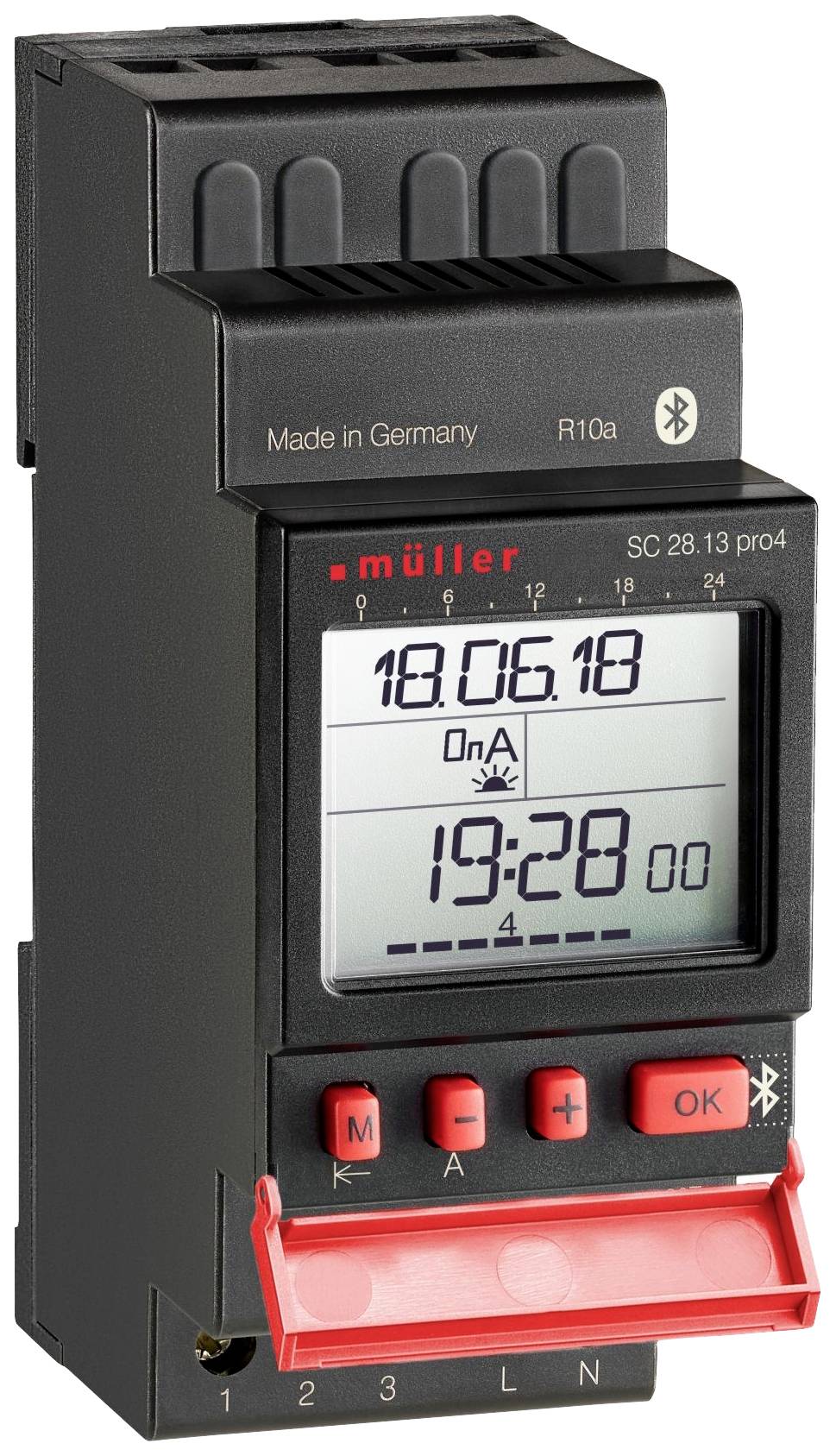 Digital timer i stående format, svart med digital display. Visar datum '18.06.18' och tid '19:28'. Tillverkad i Tyskland.