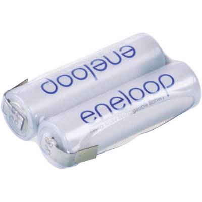 Två eneloop-batterier liggande bredvid varandra, med synlig varumärkesetikett.