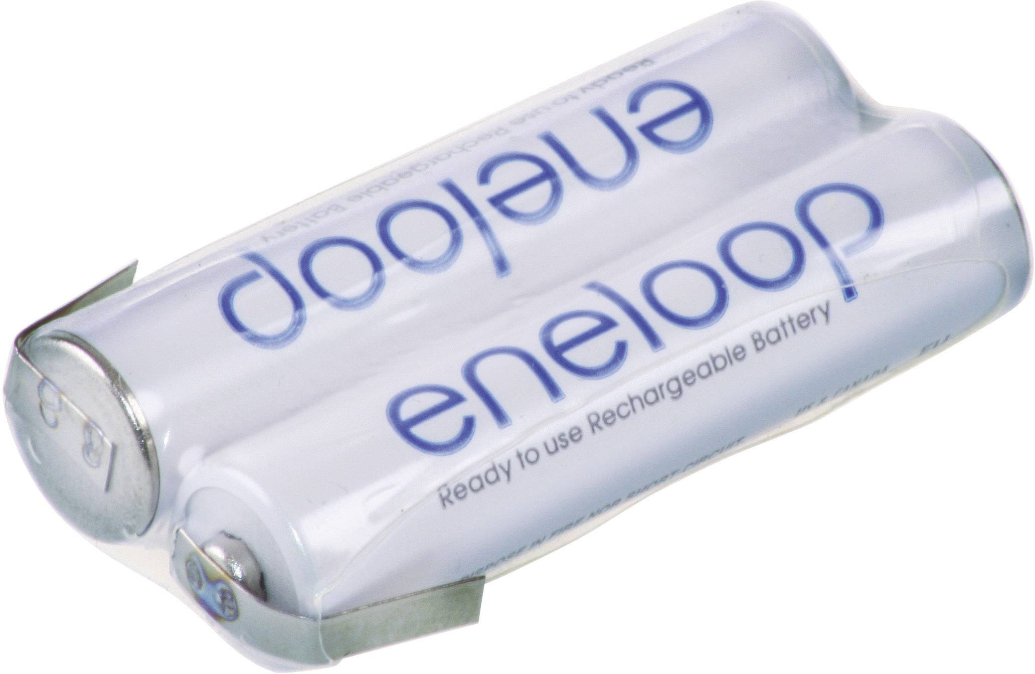 Två vita AA-batterier av märket 'eneloop', liggande på vit bakgrund, med blå text: 'Ready to use Rechargeable Battery'.