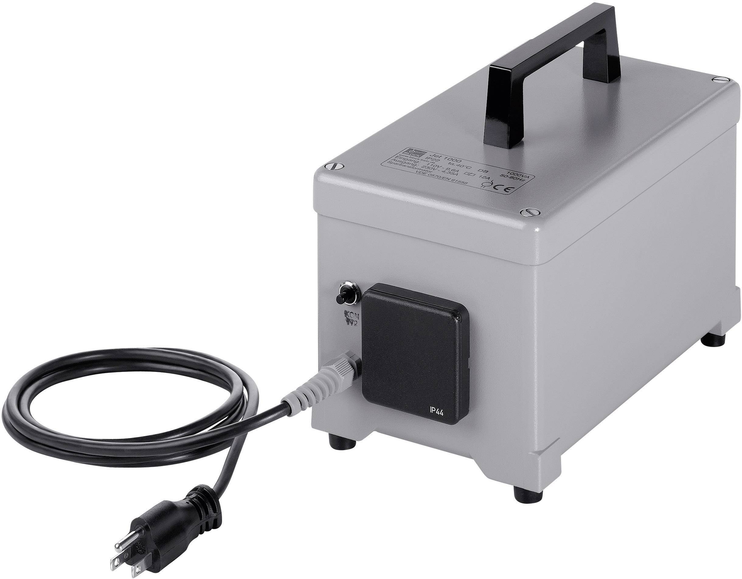Rektangulär grå transformator med svart kabel och kontakt. Ovansidan har ett bärhandtag.