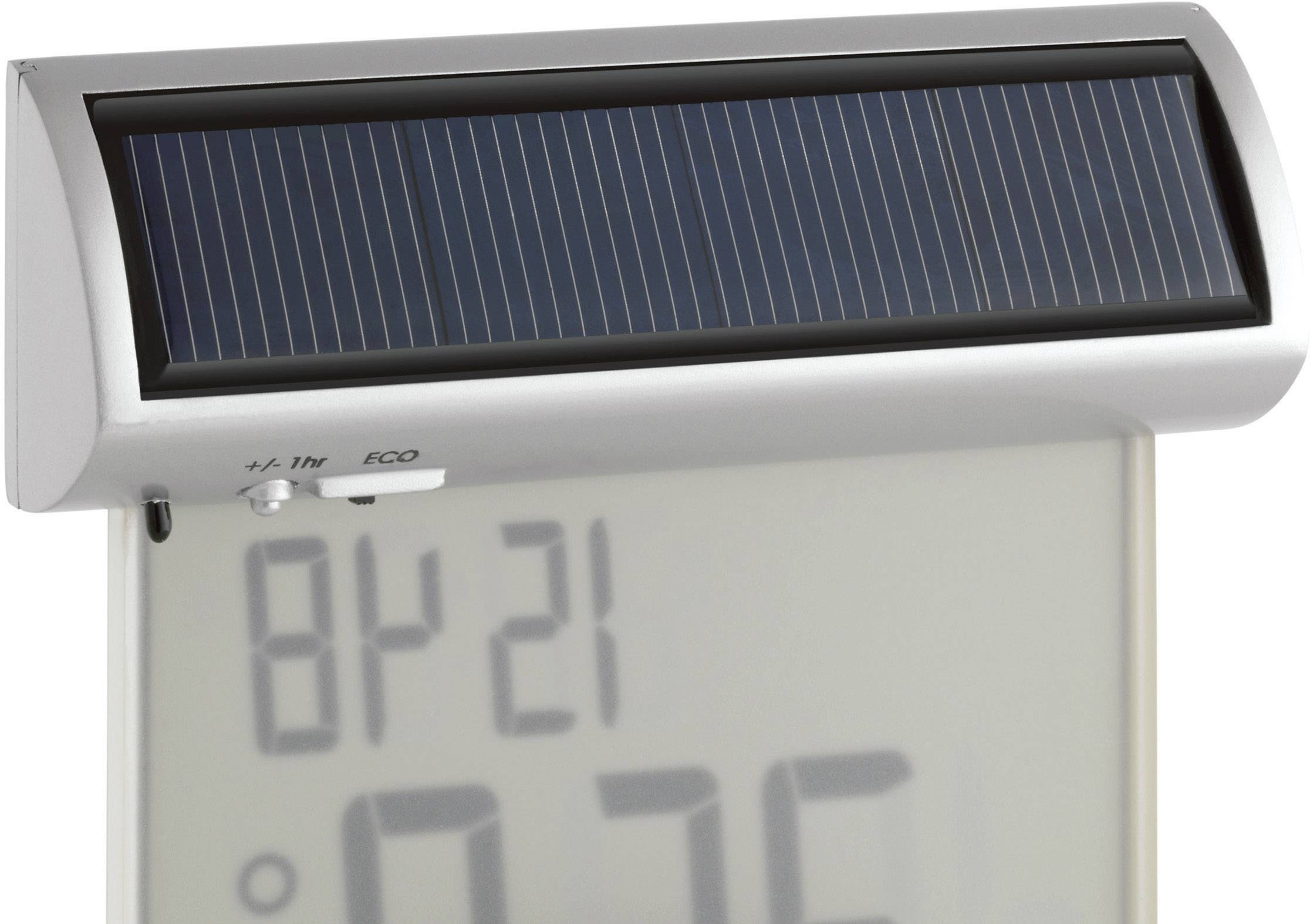 Digitalt termometer med solmodul och display, visar 21 grader Celsius.