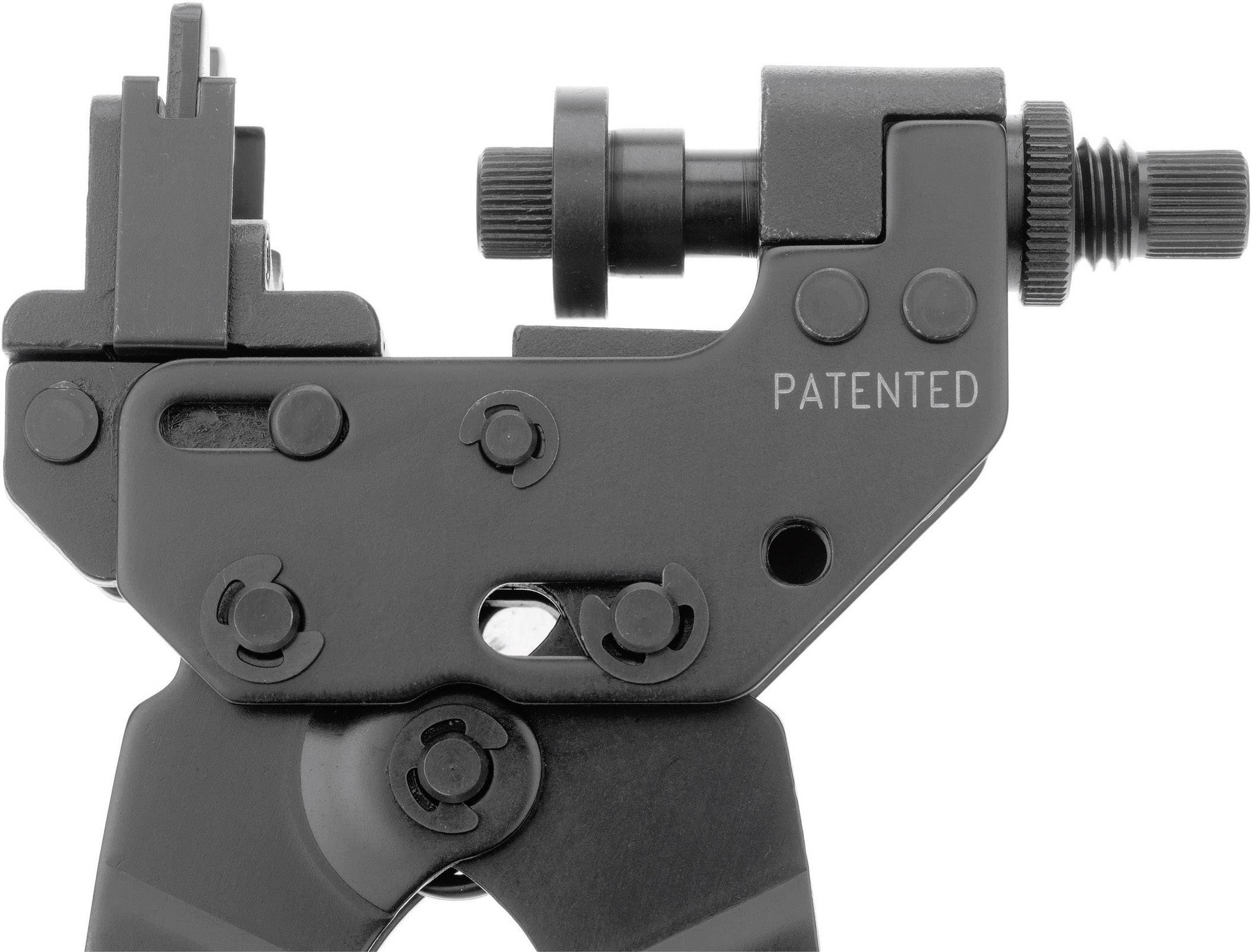 En svart metalltång med skruvar, knappar och texten 'PATENTED'. Den verkar ha utvecklats för industriella tillämpningar.
