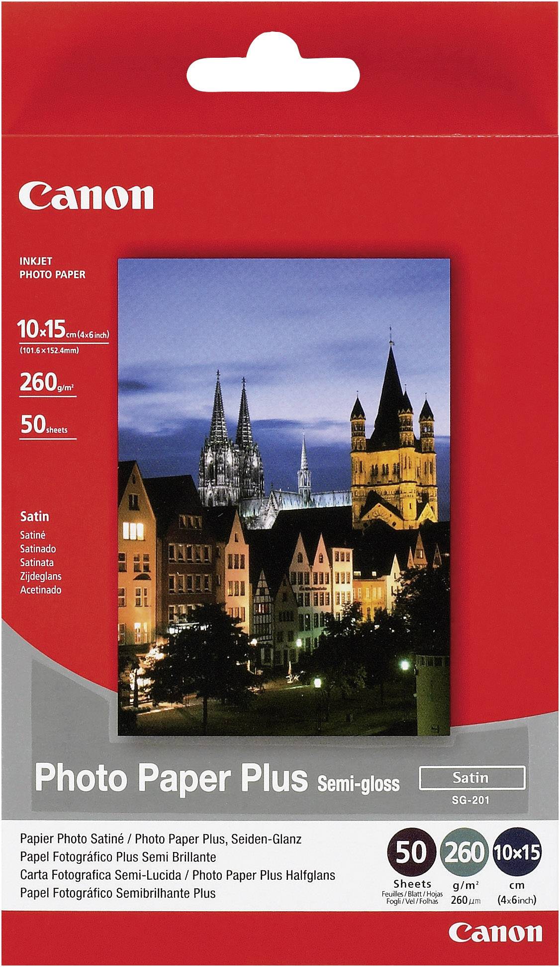 Förpackning med Canon Inkjet Photo Paper Plus halvblank fotopapper, 10x15 cm, 260 g/m², 50 ark. Bild av byggnader nattetid.
