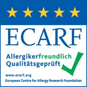 ECARF-sigill: Allergikervänlig, Kvalitetstestad, fem blå stjärnor, lila bock.