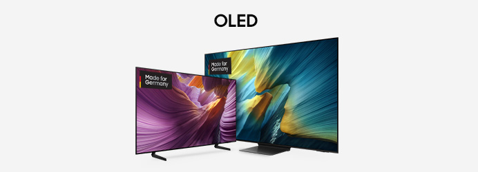  Gemini hat gesagt Zwei Samsung OLED Fernseher unterschiedlicher Größe mit farbenfrohen, abstrakten Motiven und dem „Made for Germany“-Logo vor einem hellgrauen Hintergrund unter der Überschrift „OLED“.