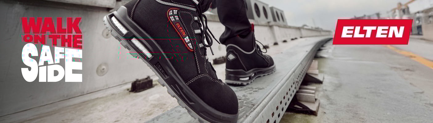 Eine Nahaufnahme zeigt eine Person, die in schwarzen ELTEN-Sicherheitsstiefeln über eine metallische Kante läuft, wobei das rote ELTEN-Logo in der oberen rechten Ecke eingeblendet ist.