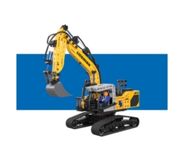 Ein großes, ferngesteuertes, gelbes Baufahrzeug von fischertechnik. Es hat eine große Schaufel und steht vor einem blauen Balken auf einem weißen Hintergrund.