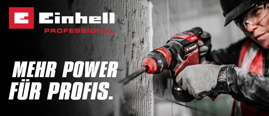Eine Person mit Schutzbrille und Handschuhen bohrt mit einem roten Einhell Professional Bohrhammer in eine Wand, während links das Einhell Professional Logo und der Slogan "MEHR POWER FÜR PROFIS." zu sehen sind.
