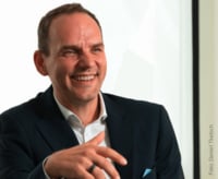 Das Bild zeigt CEO Ralf Bühler von Conrad Electronic SE während des Interviews.