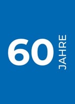 Kasten ist blau und mit der weißen Zahl "60 JAHRE" beschriftet
