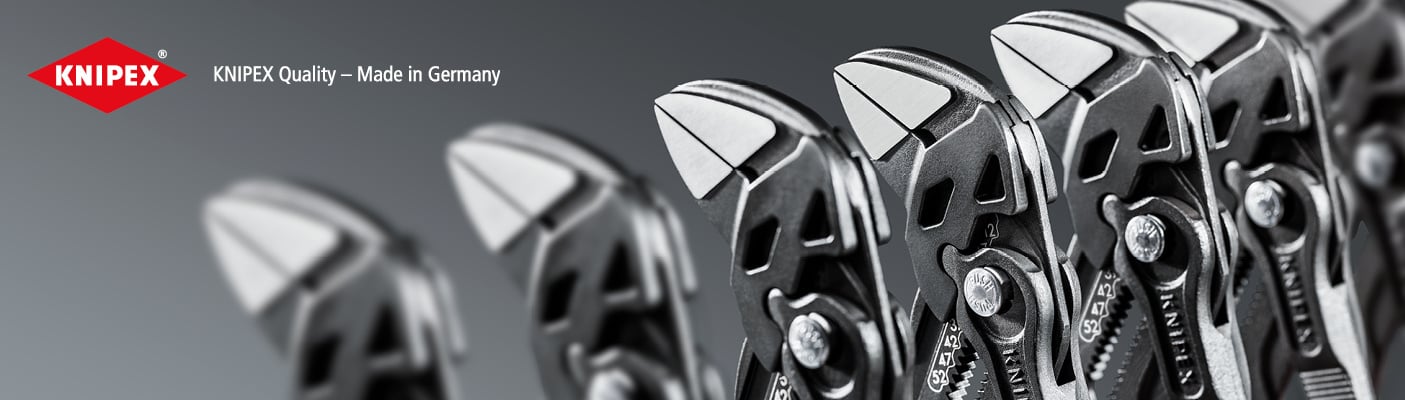 Eine Reihe von Knipex-Werkzeugen, mit scharfem Fokus auf das vorderste. Text: Knipex Quality – Made in Germany.