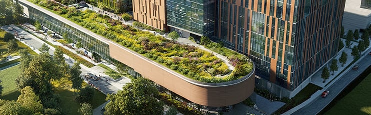 Abb. modernes Krankenhausgebäudes, mit Blick auf Nachhaltigkeit. Zeigt begrünte Dächer, Sonnenkollektoren und energieeffiziente Fenster