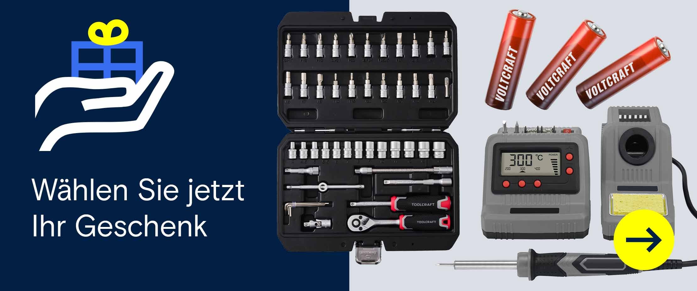 Geöffneter Werkzeugkoffer, Lötstation und Voltcraft-Batterien neben dem Hinweis „Wählen Sie jetzt Ihr Geschenk“.