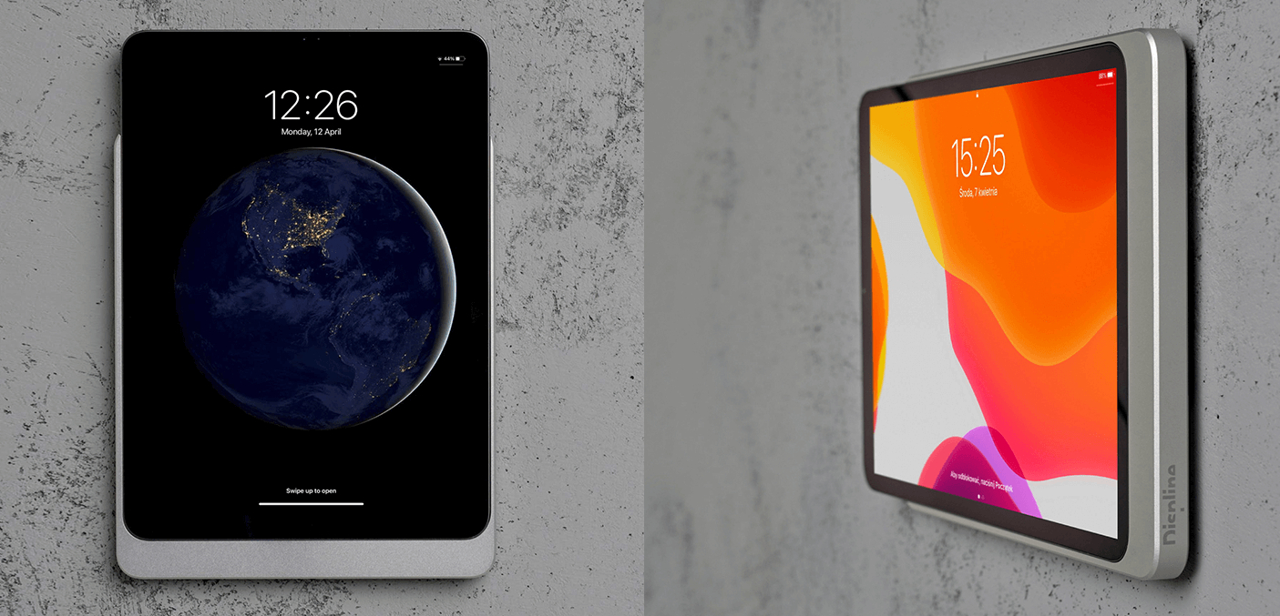 Zwei iPads mit einer Displine Wandhalterung an der Wand befestigt.