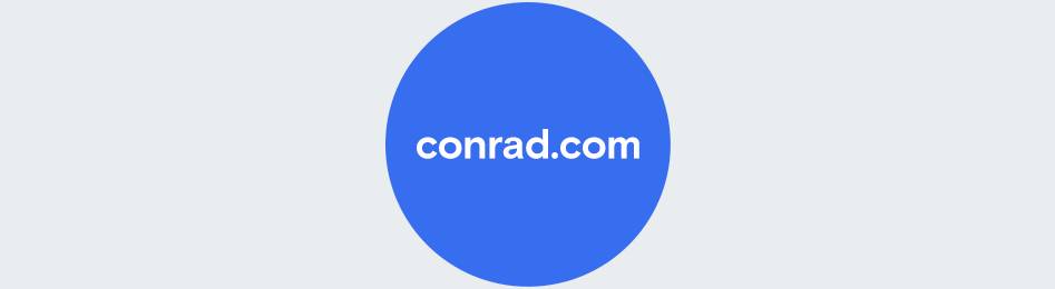 Blue circle with white lettering “conrad.com”.