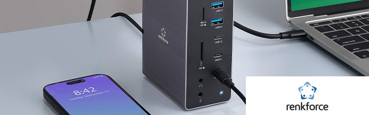 Un gros plan d'un bureau avec une station d'accueil USB et le logo Renkforce est visible dans le coin inférieur droit