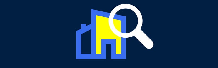 Icône colorée représentant un bâtiment avec une grande loupe